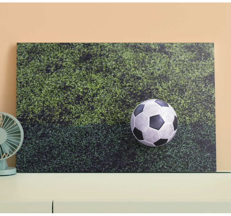Beautiful dirty football on grass teen canvas - TenStickers